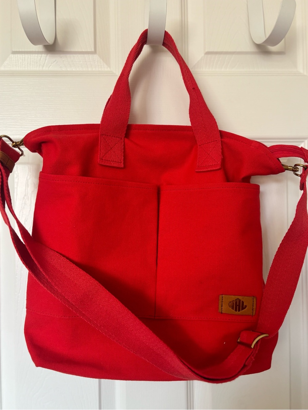 Red Canvas Tote with Front Pockets and Adjustable Strap